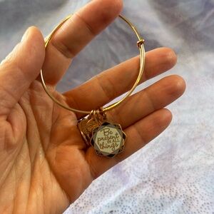 Alex and Ani set of four rose gold bracelets.